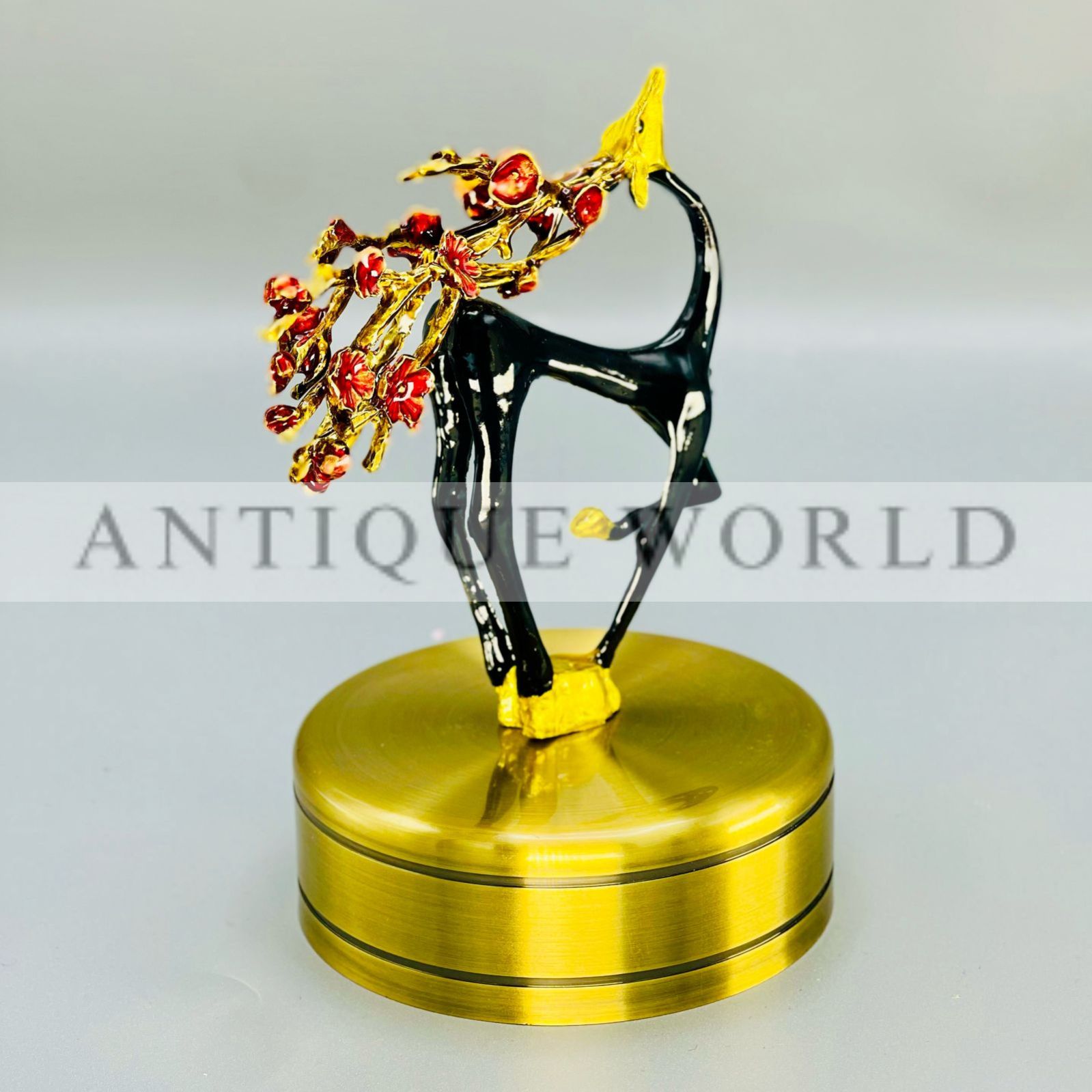 Handcrafted Black and Gold Deer Figurine with Floral Branches