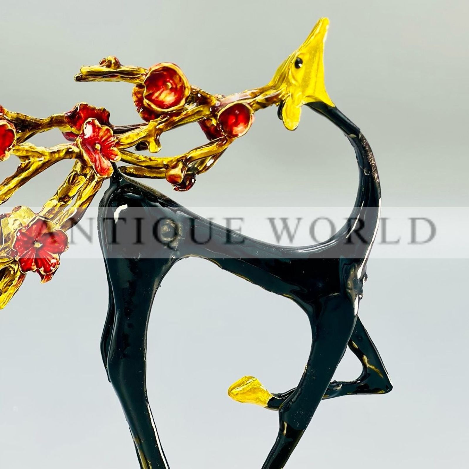 Handcrafted Black and Gold Deer Figurine with Floral Branches