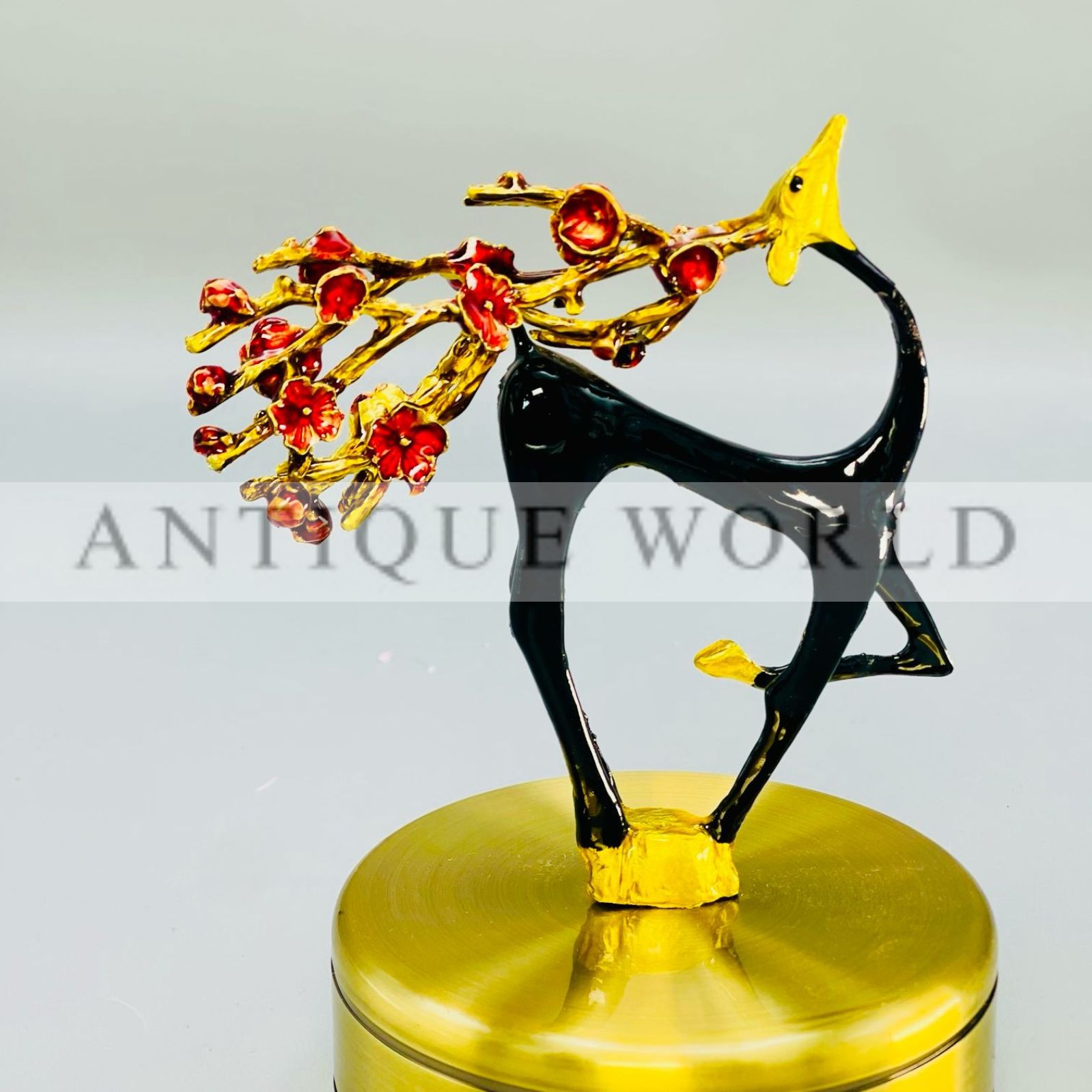 Handcrafted Black and Gold Deer Figurine with Floral Branches