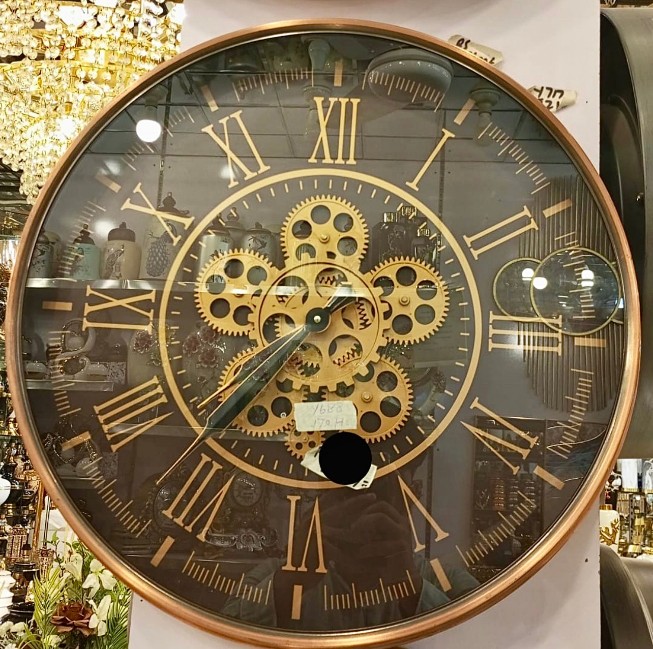 Black Wall Clock with Moving Gears