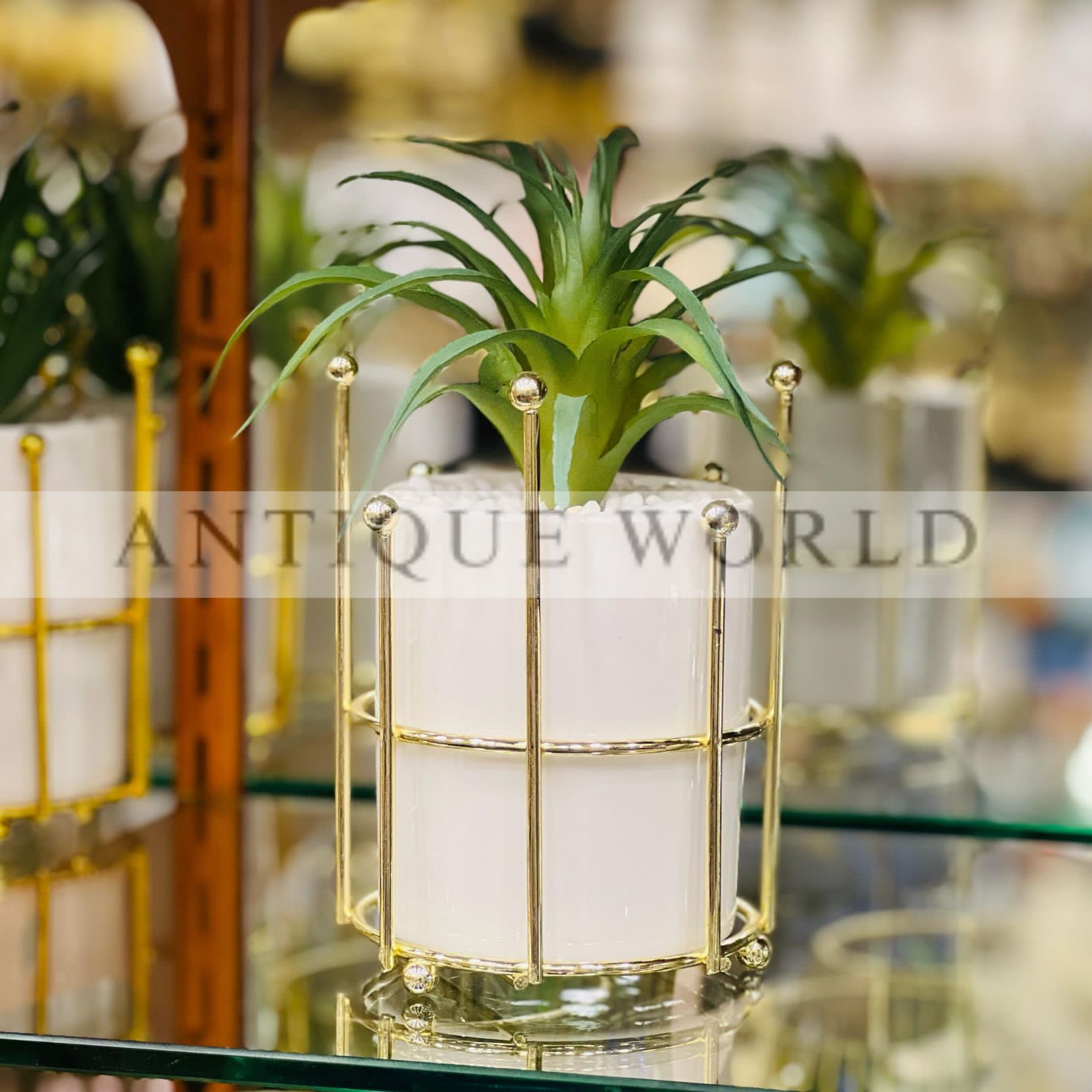 Gilded Metal Stand with Plant