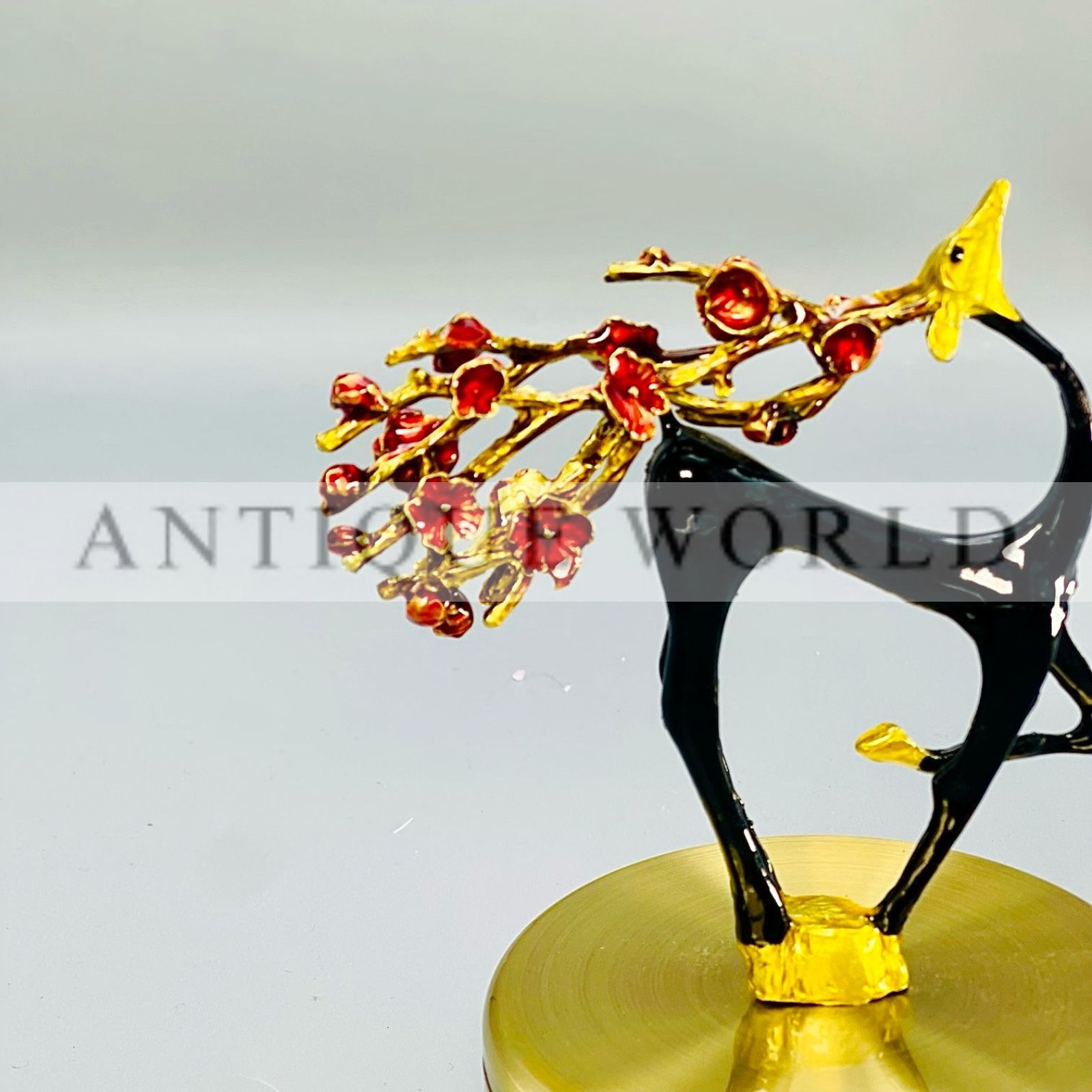 Handcrafted Black and Gold Deer Figurine with Floral Branches