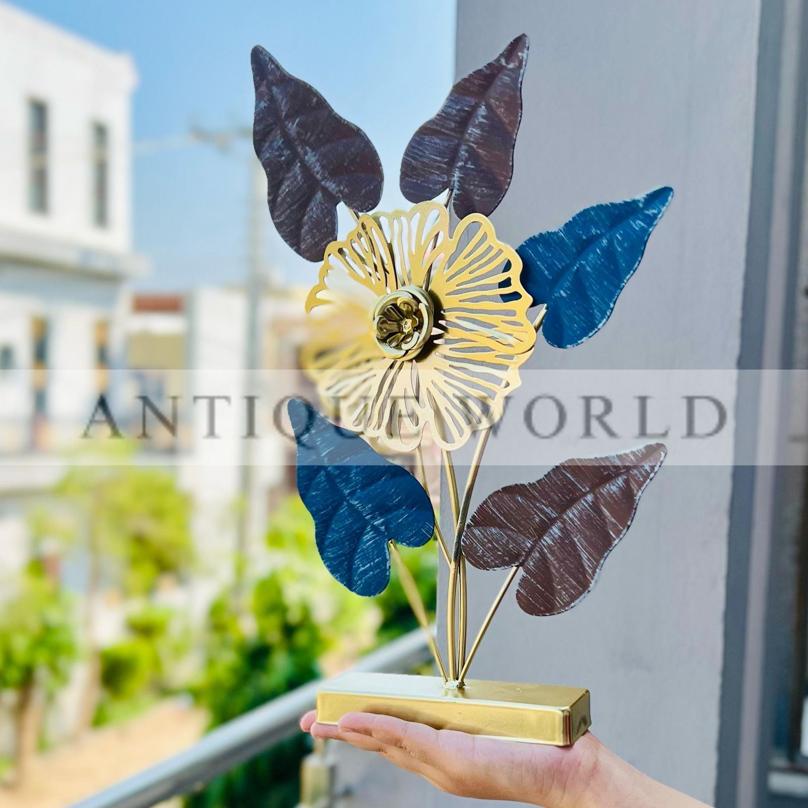 Golden Metal Floral Table Décor with Colored Leaves