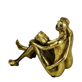 Golden Couple Reading Book Sculpture