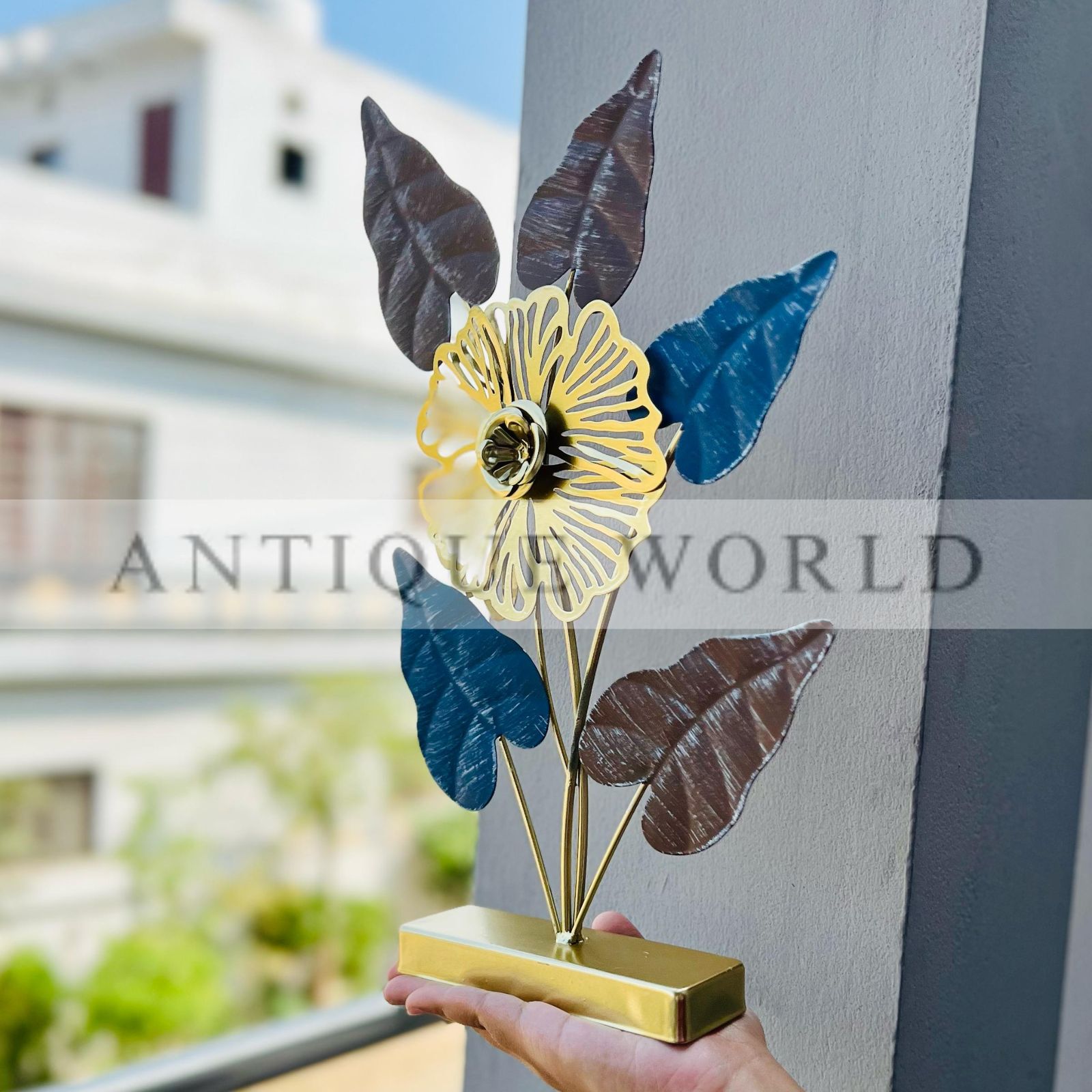 Golden Metal Floral Table Décor with Colored Leaves